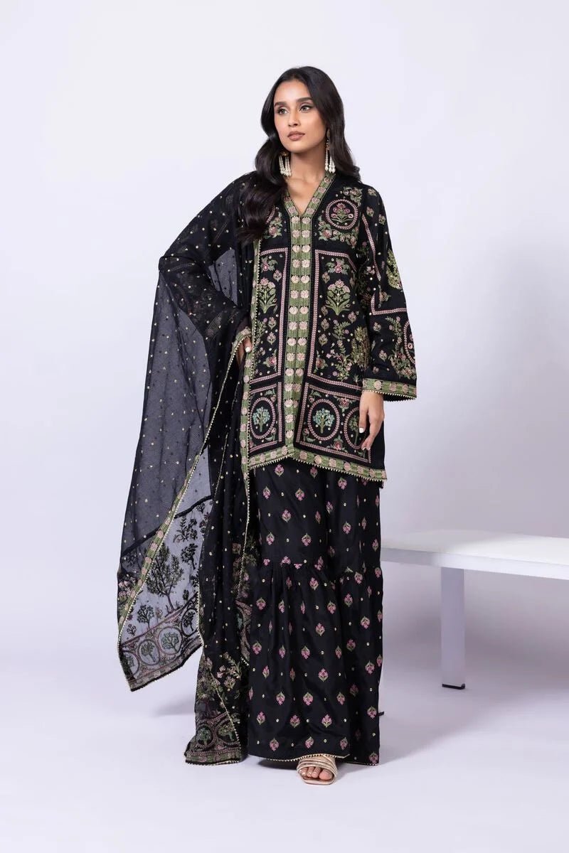 Model wearing Khaadi EST24608A black dress with intricate multicolor embroidery and gharara. Shop Pakistani clothes online in the UK now.