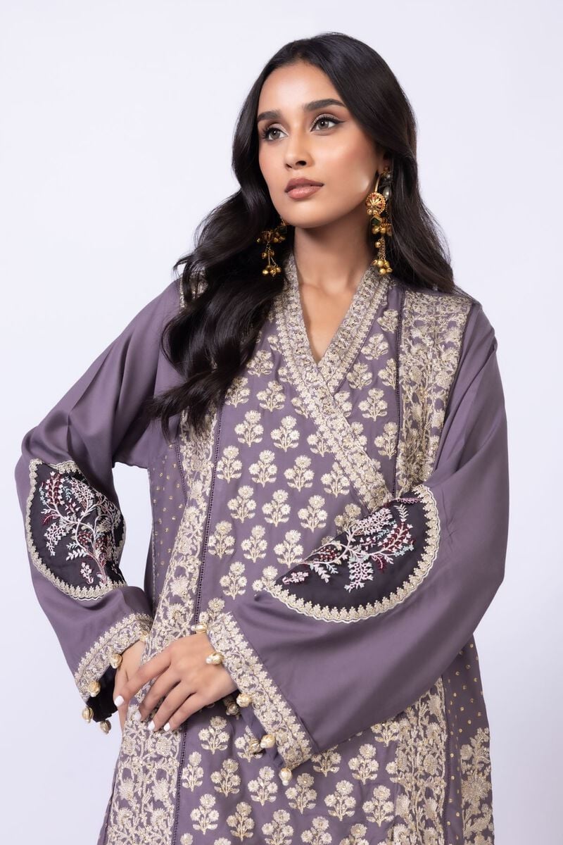 Model wearing Khaadi EST24615B grey dress with intricate embroidery and elegant detailing. Shop Pakistani clothes online in the UK now.