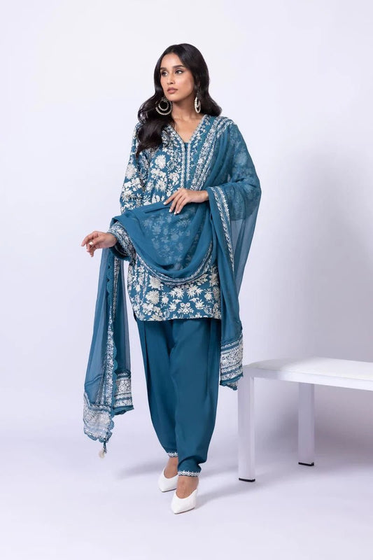 Model wearing Khaadi EST24634B teal blue embroidered dress with matching dupatta and trousers. Shop Pakistani clothes online in the UK now.