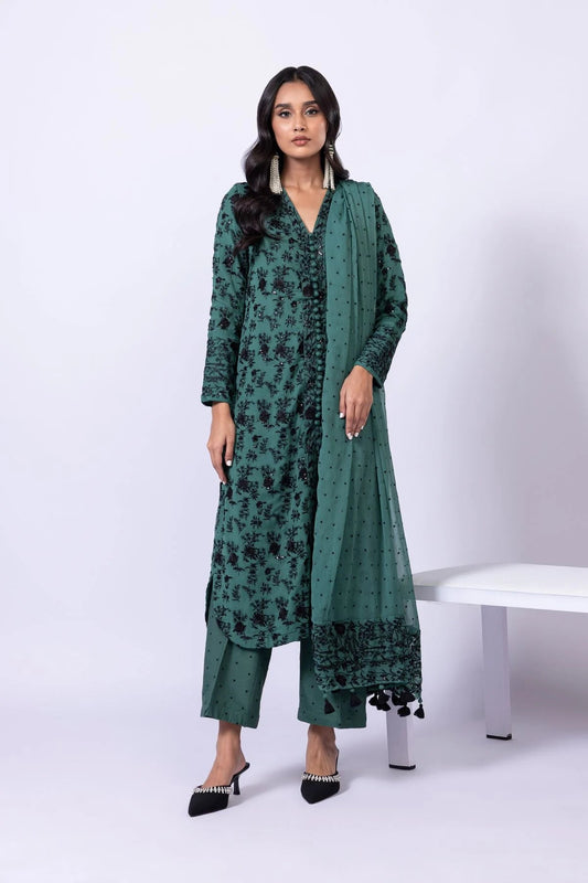 Model wearing Khaadi EST24635A green dress with black embroidered details and chiffon dupatta. Shop Pakistani clothes online in the UK now.