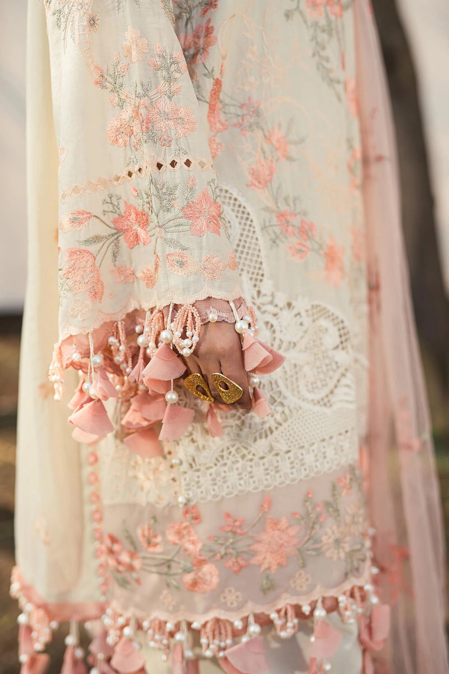 Elegant Sana Safinaz L241 - 003B - 3CT dress, with intricate embroidery and soft peach accents.