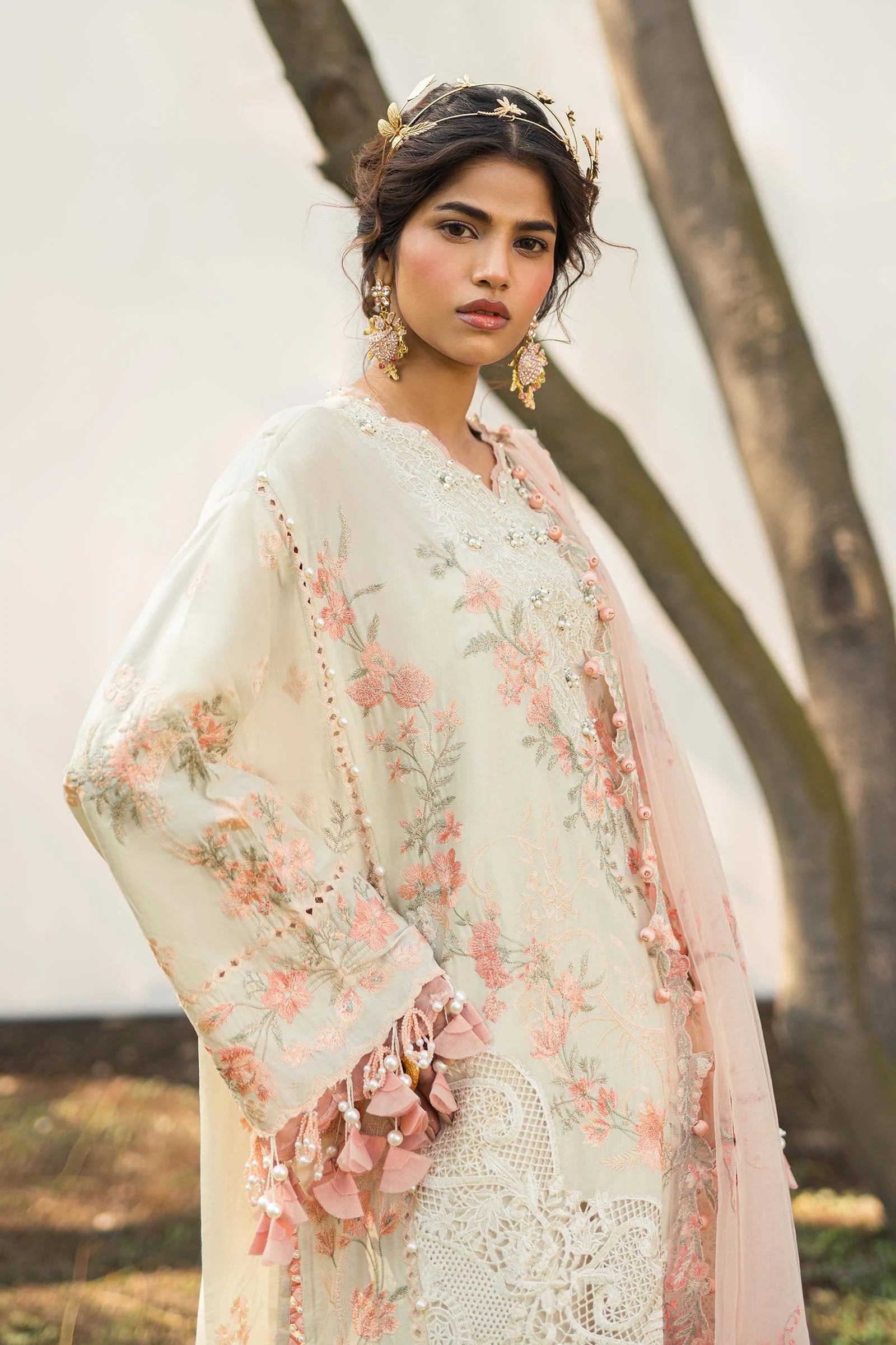 Elegant Sana Safinaz L241 - 003B - 3CT dress, with intricate embroidery and soft peach accents.