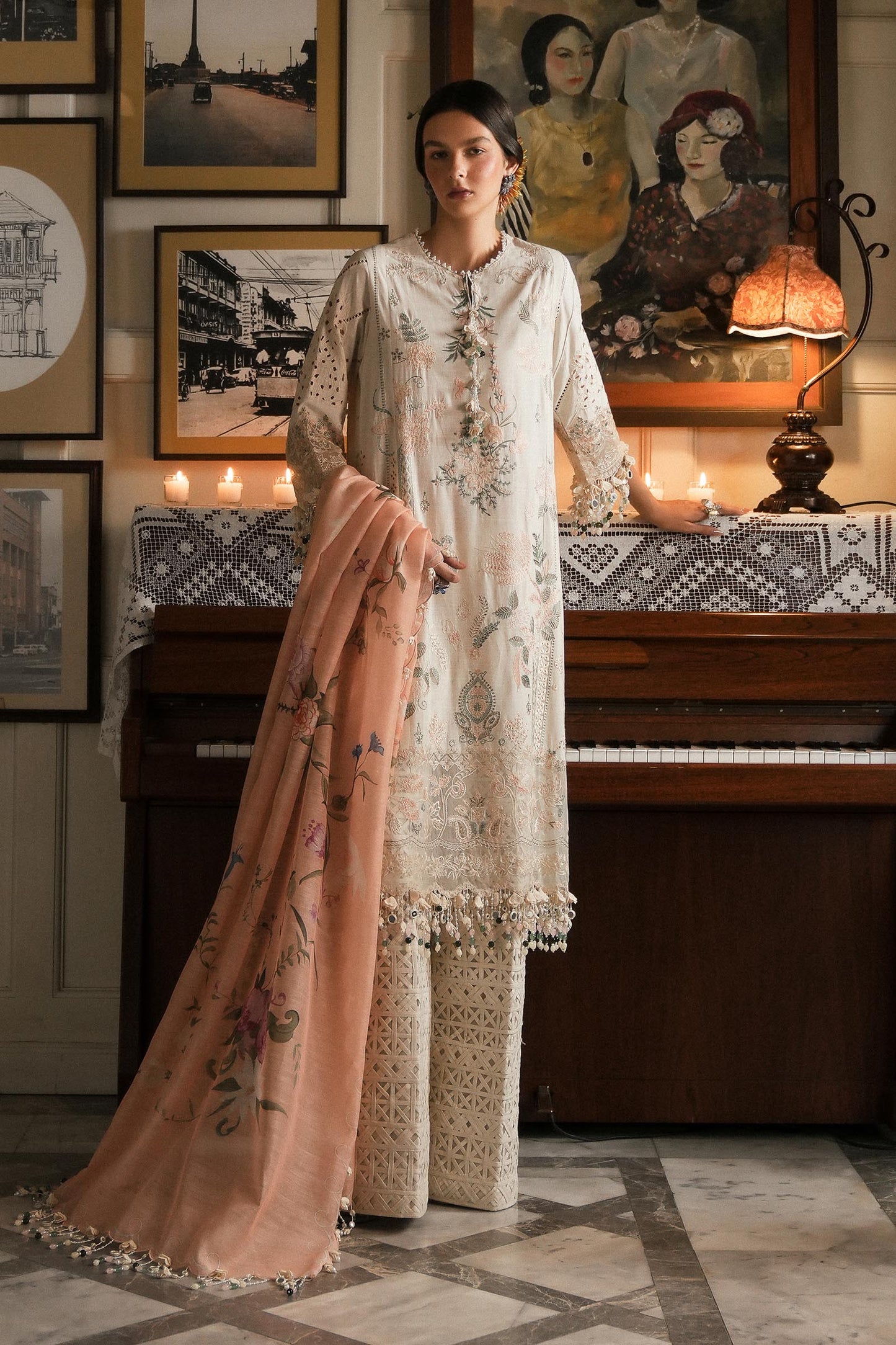 Model wearing ivory and peach embroidered outfit from Sana Safinaz, Luxury Lawn '25, perfect for Pakistani luxury pret online in UK.