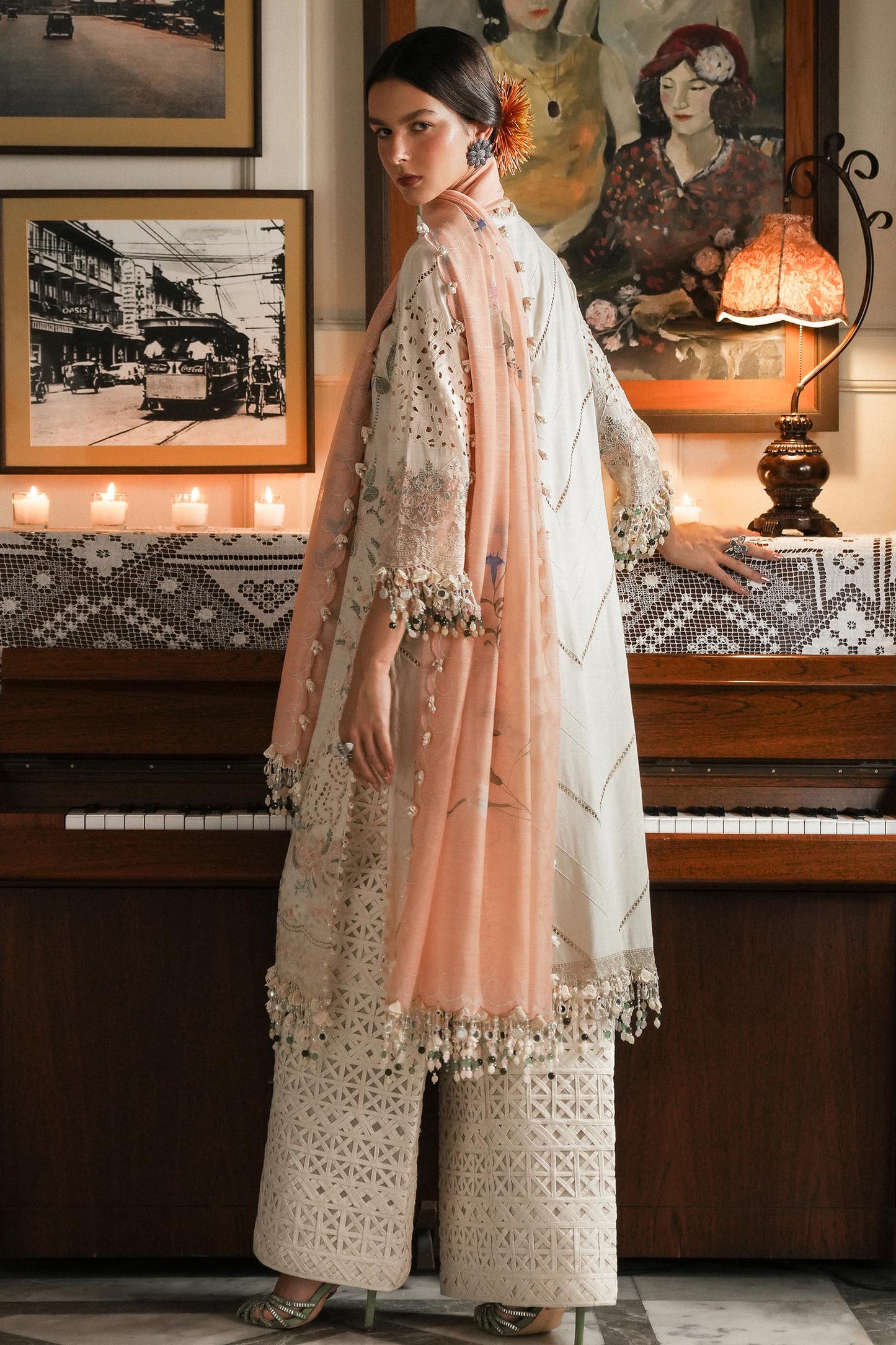 Model wearing ivory and peach embroidered outfit from Sana Safinaz, Luxury Lawn '25, perfect for Pakistani luxury pret online in UK.