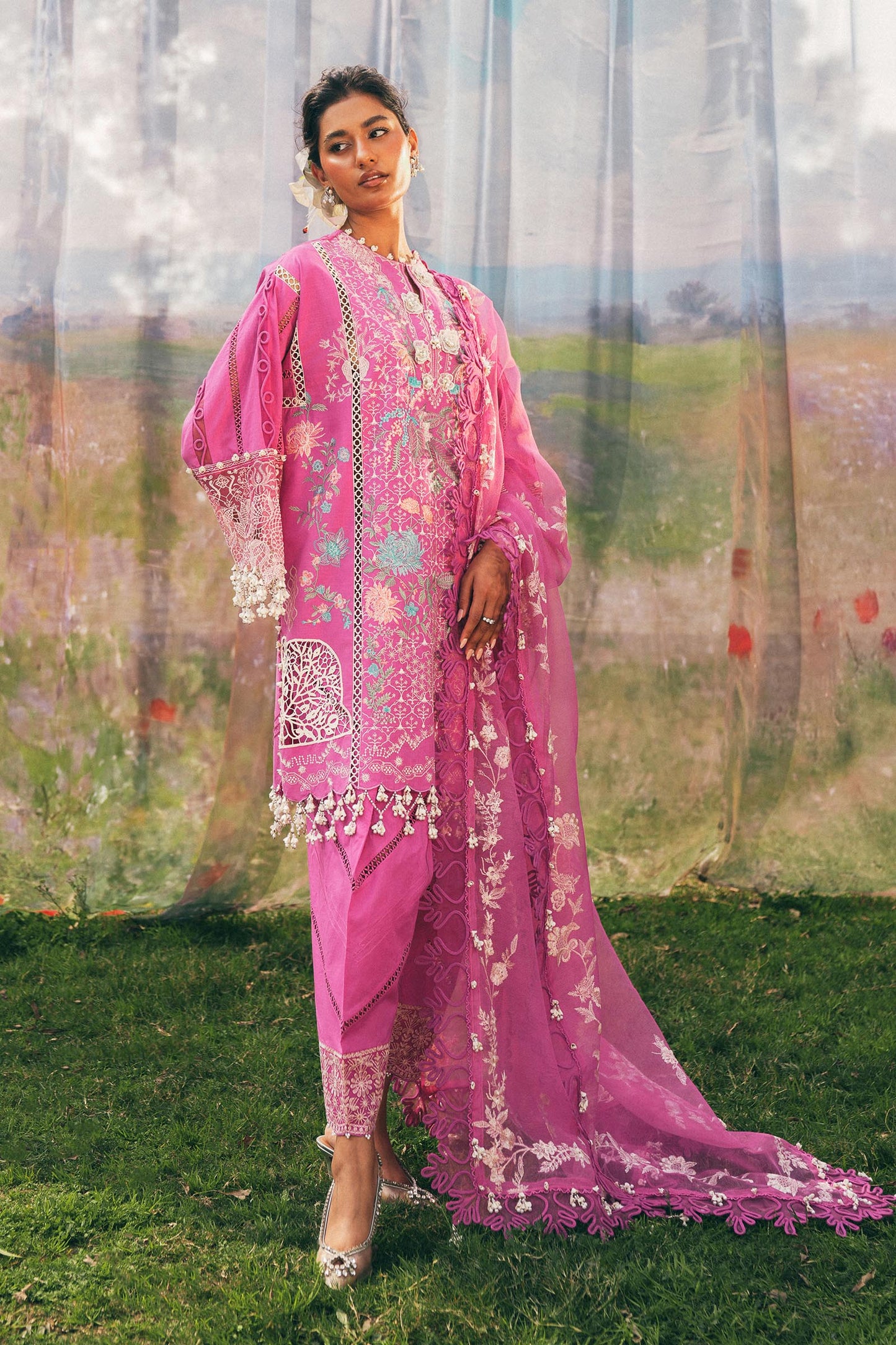 Model wearing bright pink embroidered outfit from Sana Safinaz, Luxury Lawn '25, perfect for Pakistani clothes online in UK and luxury pret.