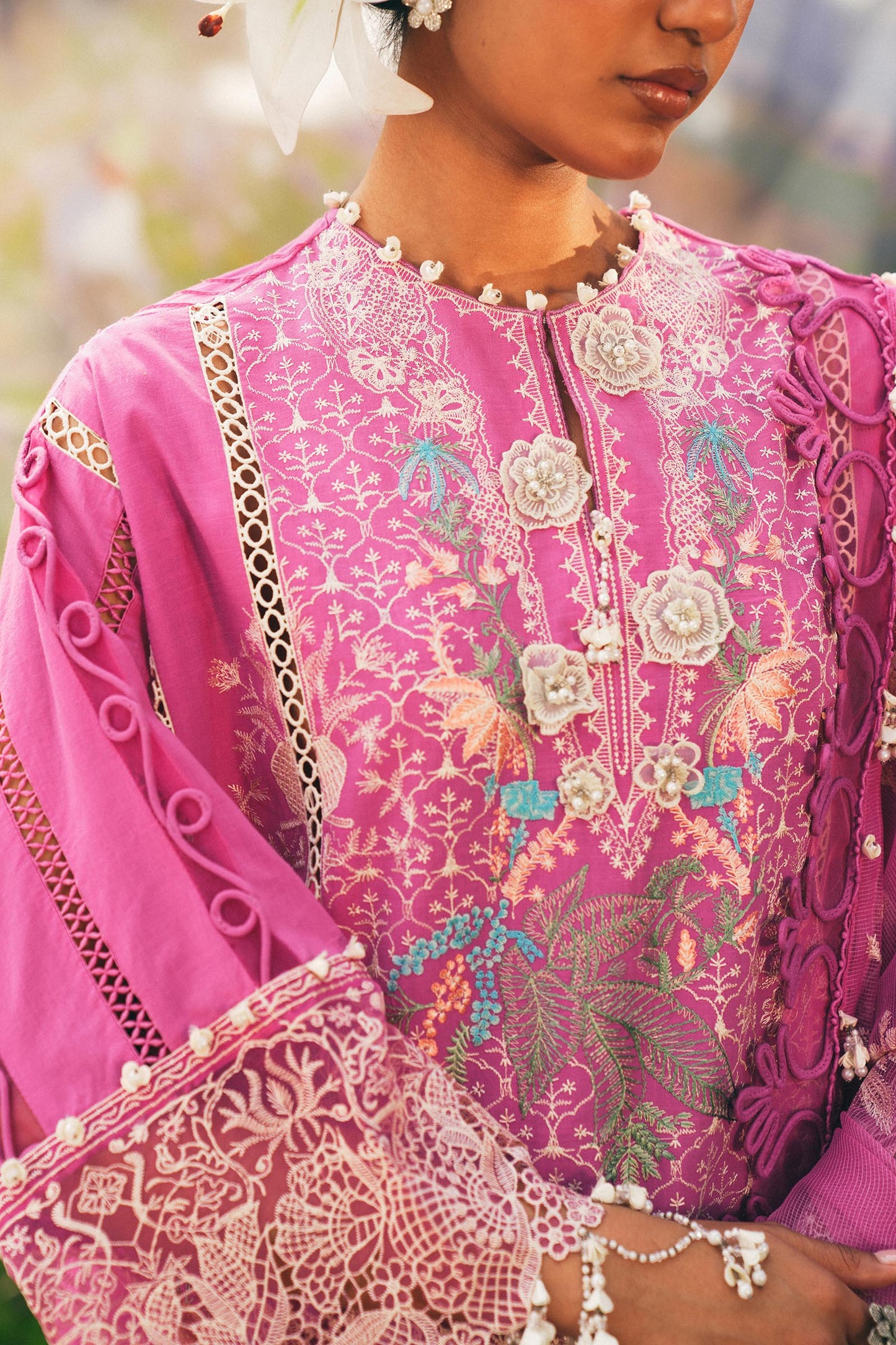 Model wearing bright pink embroidered outfit from Sana Safinaz, Luxury Lawn '25, perfect for Pakistani clothes online in UK and luxury pret.