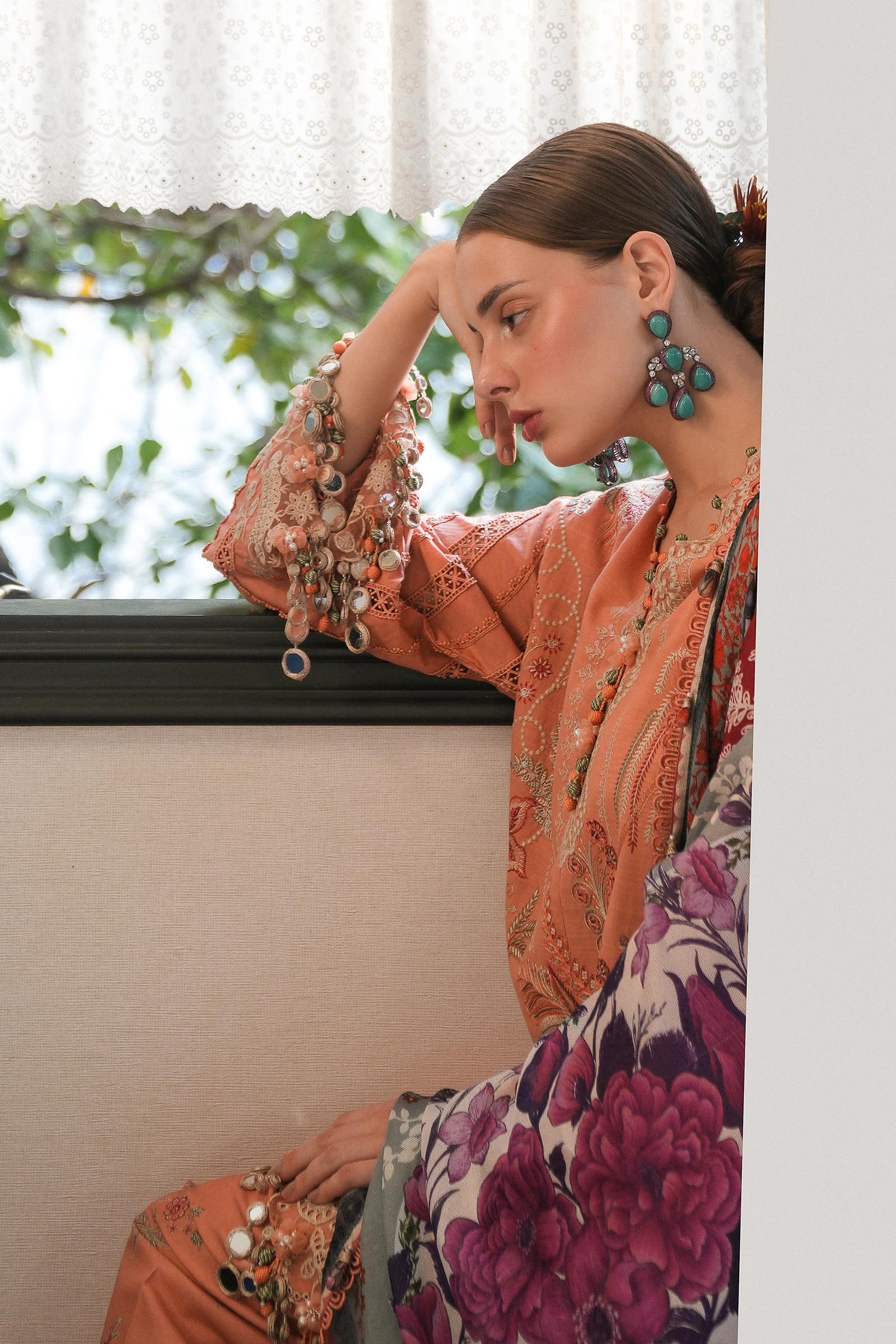 Model wearing peach embroidered dress with multicolour printed dupatta from Sana Safinaz Luxury Lawn '25, Pakistani clothes online in UK.
