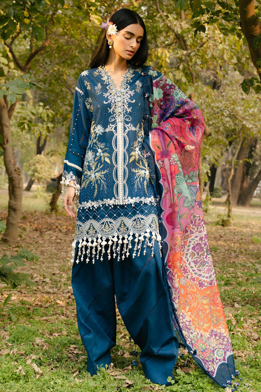 Model wearing navy blue embroidered dress with multicolor dupatta from Sana Safinaz Luxury Lawn '25, Pakistani clothes online in UK.