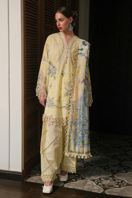 Model wearing lemon yellow embroidered dress with printed dupatta from Sana Safinaz Luxury Lawn '25, Pakistani clothes online in UK.