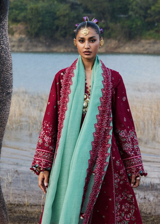 Model wearing Hussain Rehar Luxury Lawn '25 Mahogany in maroon with intricate embroidery. Shop Pakistani luxury pret online in the UK.