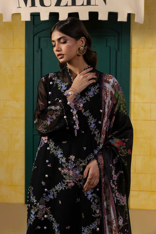 Model wearing black floral embroidered dress with multicolour printed dupatta from Sana Safinaz Muzlin Spring '25, Pakistani Luxury pret UK.