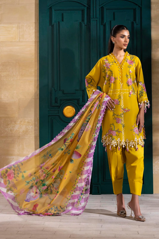 Model wearing mustard yellow Sana Safinaz M251-013B-3CL outfit with pink floral embroidery and printed dupatta, Pakistani Luxury pret UK.