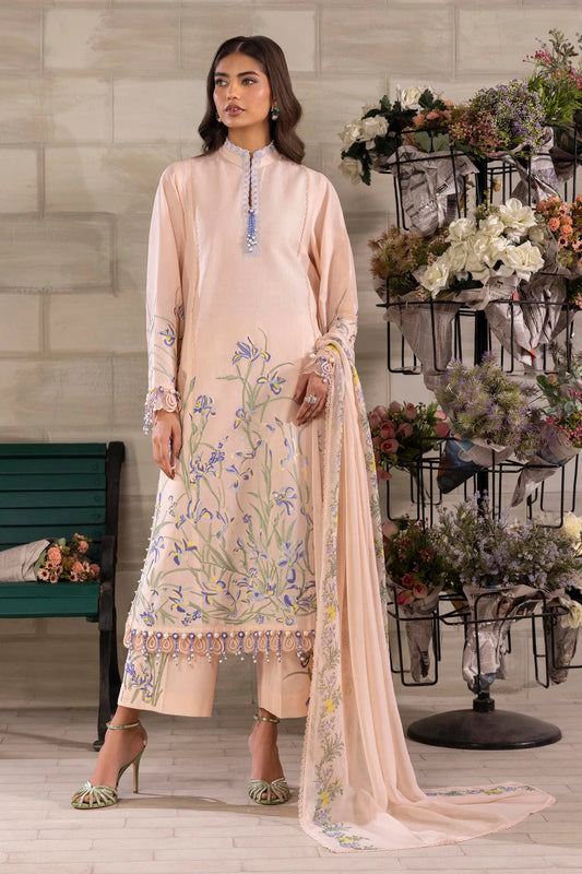Model wearing peach Sana Safinaz M251-017B-3CJ outfit with blue floral embroidery and matching dupatta, Pakistani Luxury pret in UK.