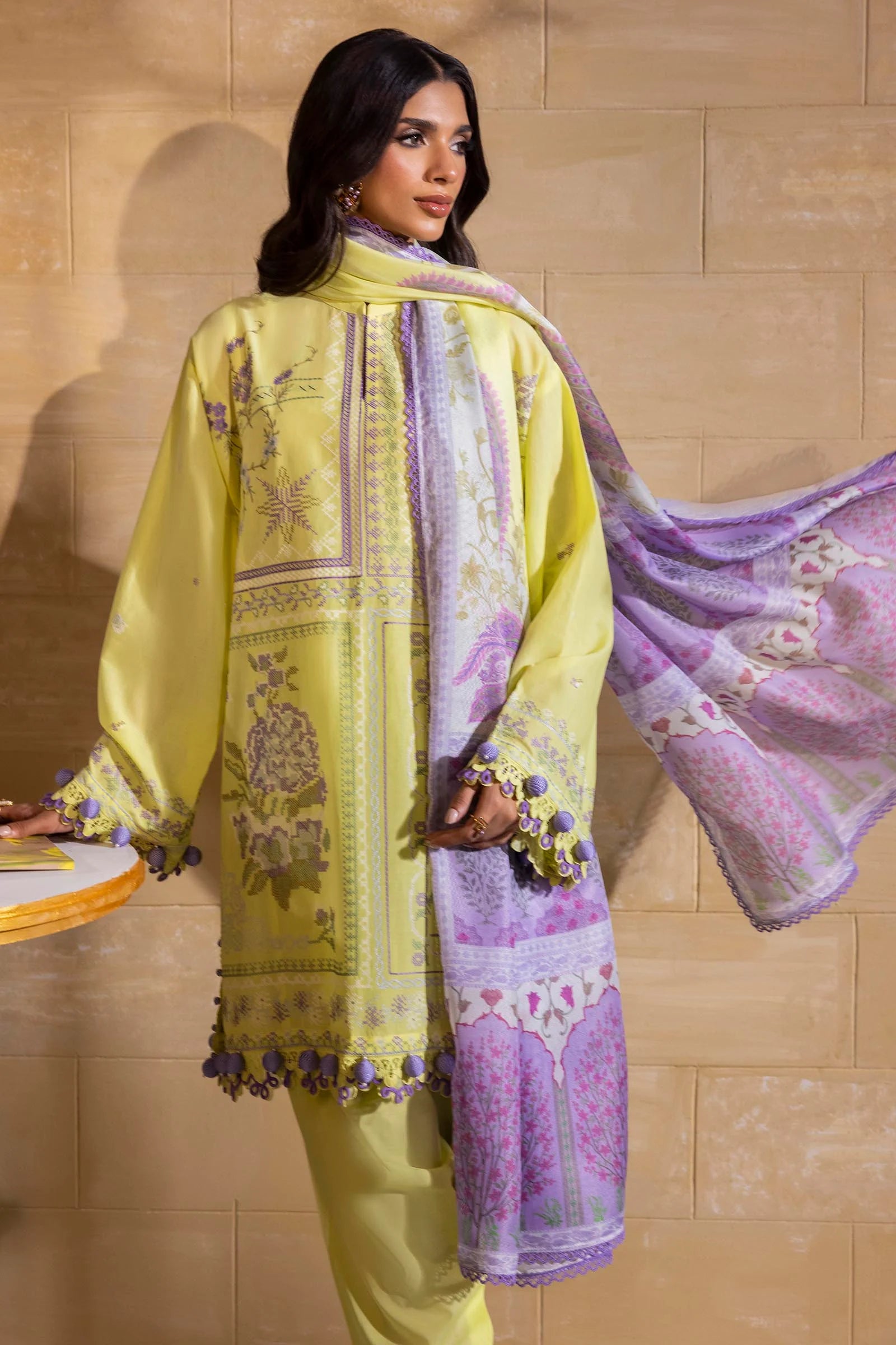 Model wearing lemon yellow Sana Safinaz M251-018B-3CT outfit with lilac embroidered details and printed dupatta, Pakistani Luxury pret in UK.