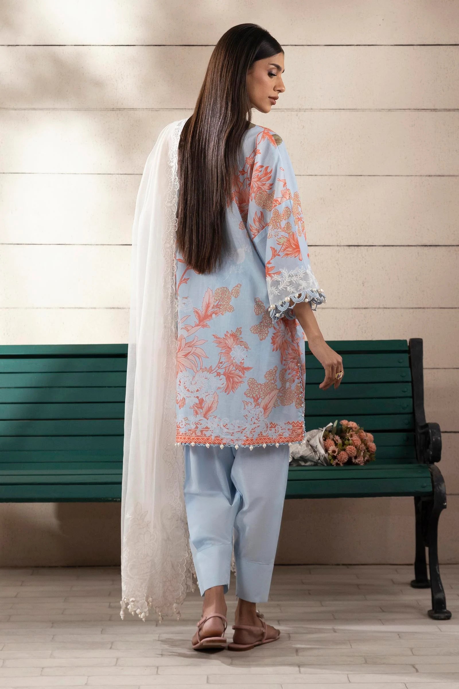 Model wearing sky blue Sana Safinaz M251-020B-3CS outfit with peach floral embroidery and white lace dupatta, Pakistani Luxury pret online in UK.