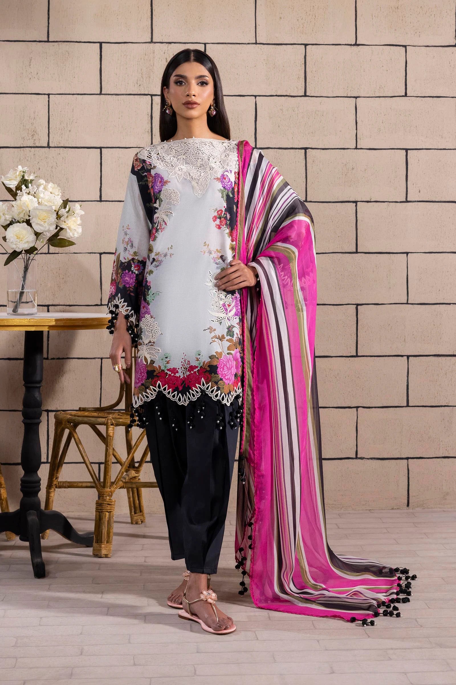 Model wearing white and black Sana Safinaz M251-022A-3CI outfit with floral embroidery and pink striped dupatta, Pakistani Luxury pret, Pakistani clothes online in UK.