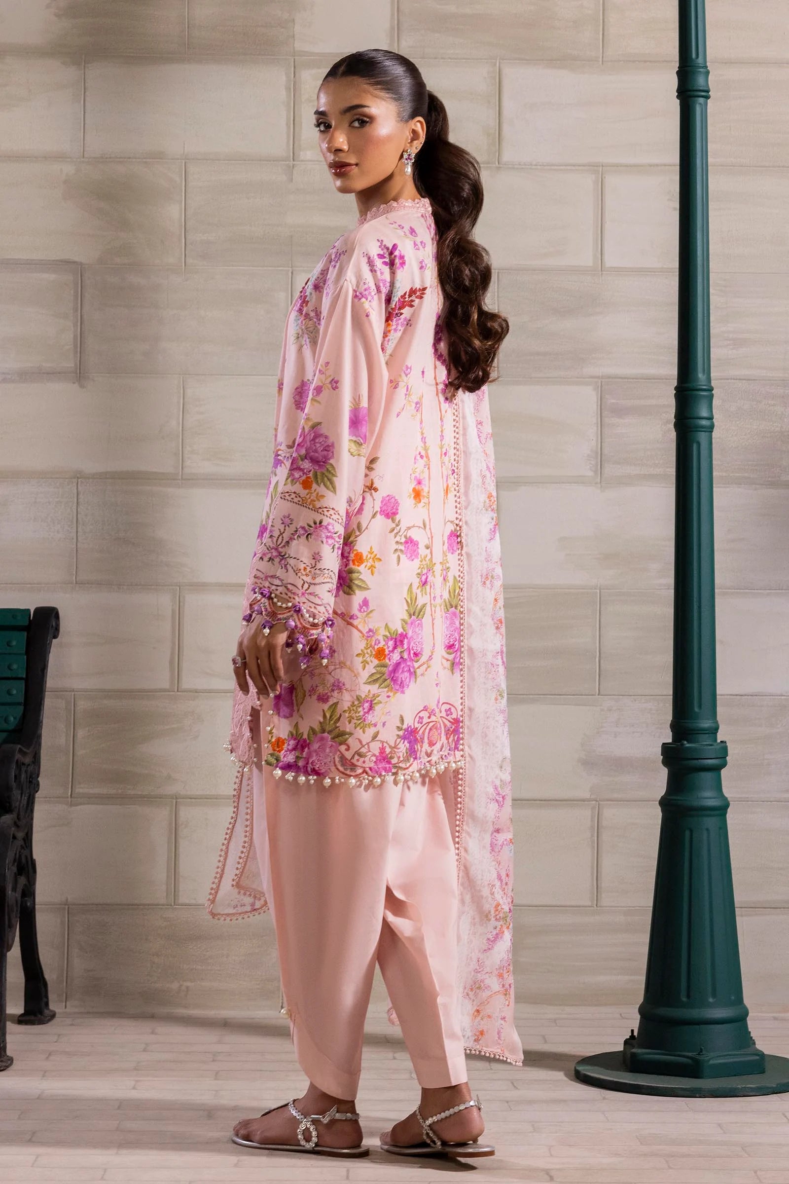 Model wearing blush pink Sana Safinaz M251-026B-3CI outfit with vibrant floral embroidery and matching dupatta, Pakistani Luxury pret, Pakistani clothes online in UK.