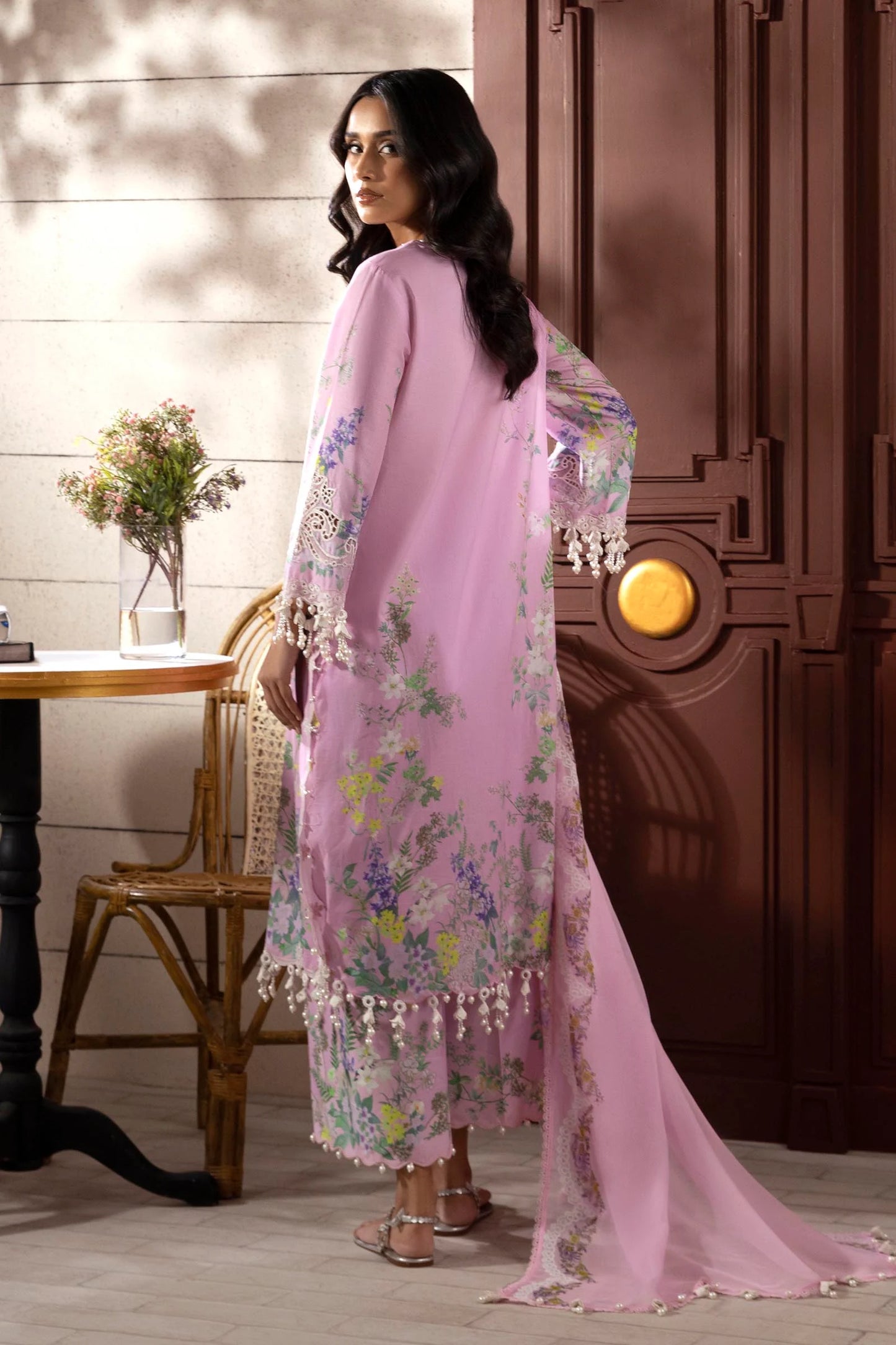 Model wearing lilac pink Sana Safinaz M251-030B-3CI outfit with pastel floral prints and lace detailing, Pakistani Luxury pret, Pakistani clothes online in UK.
