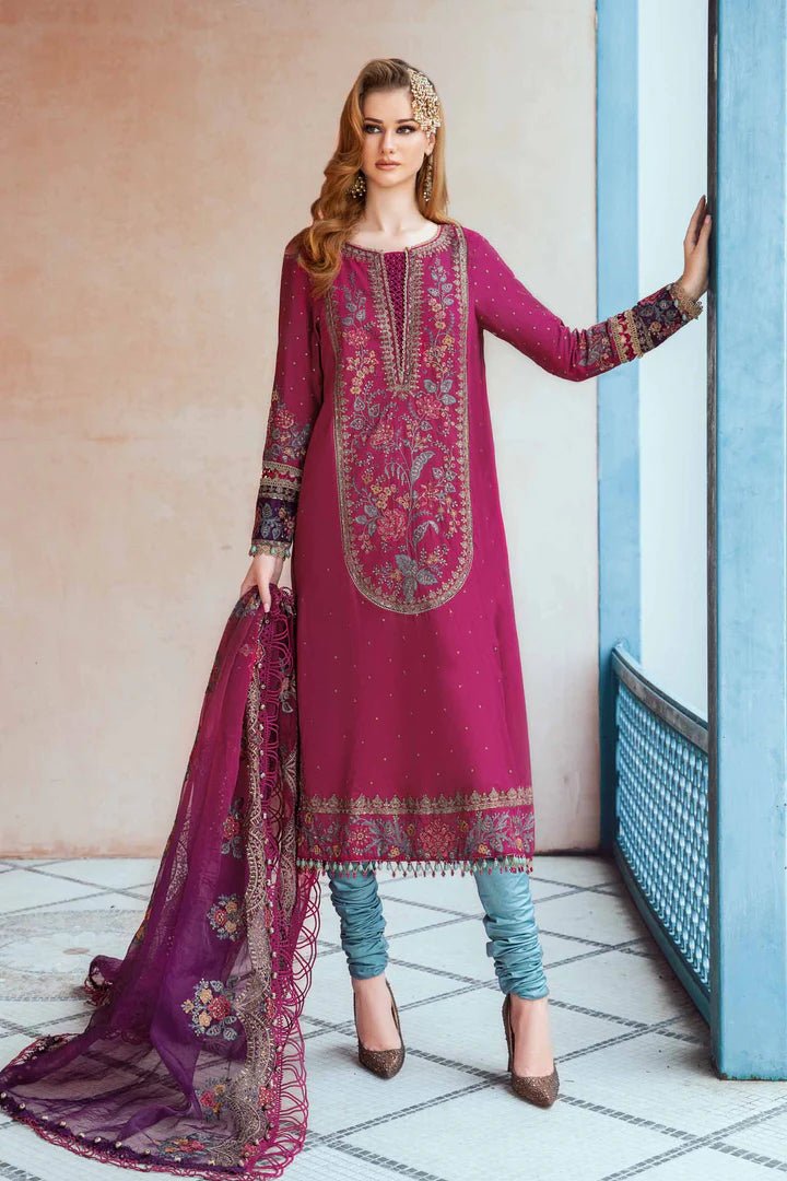 Model wearing Maria B Magenta CST 704 dress, showcasing Pakistani clothes in UK