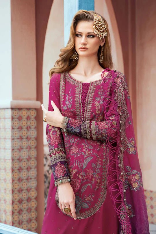 Model wearing Maria B Magenta CST 704 dress, showcasing Pakistani clothes in UK