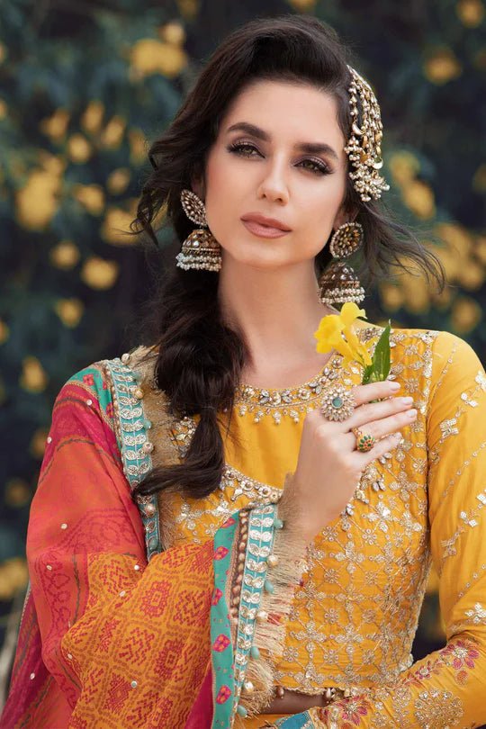 Model wearing Maria B Yellow CST - 705 dress, showcasing Pakistani clothes in UK