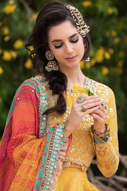 Model wearing Maria B Yellow CST - 705 dress, showcasing Pakistani clothes in UK