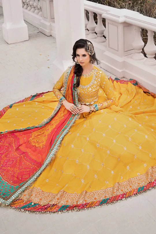 Model wearing Maria B Yellow CST - 705 dress, showcasing Pakistani clothes in UK