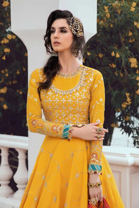 Model wearing Maria B Yellow CST - 705 dress, showcasing Pakistani clothes in UK