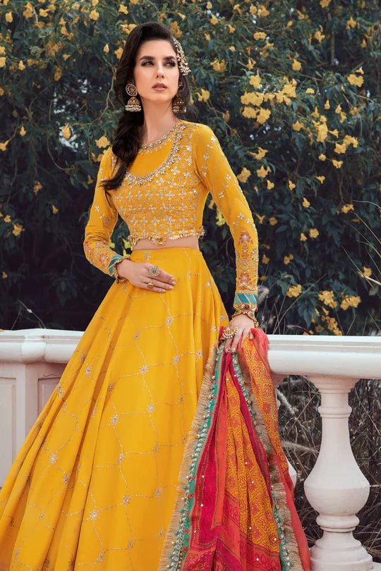 Model wearing Maria B Yellow CST - 705 dress, showcasing Pakistani clothes in UK