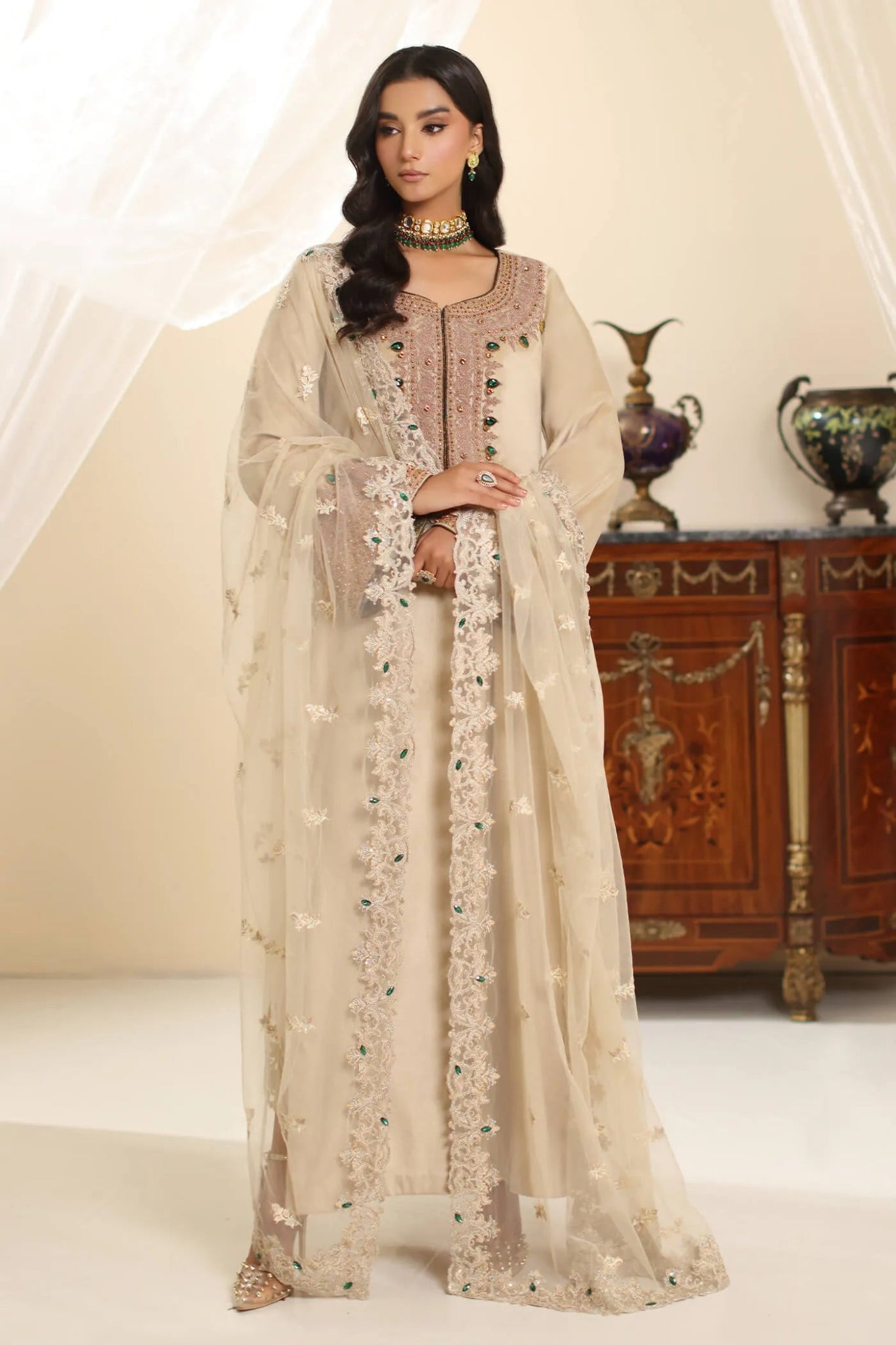 Model wearing Musferah Saad Champagne Grace dress in elegant beige from the Amor a La Vida collection, ideal for Pakistani wedding clothes online in the UK.