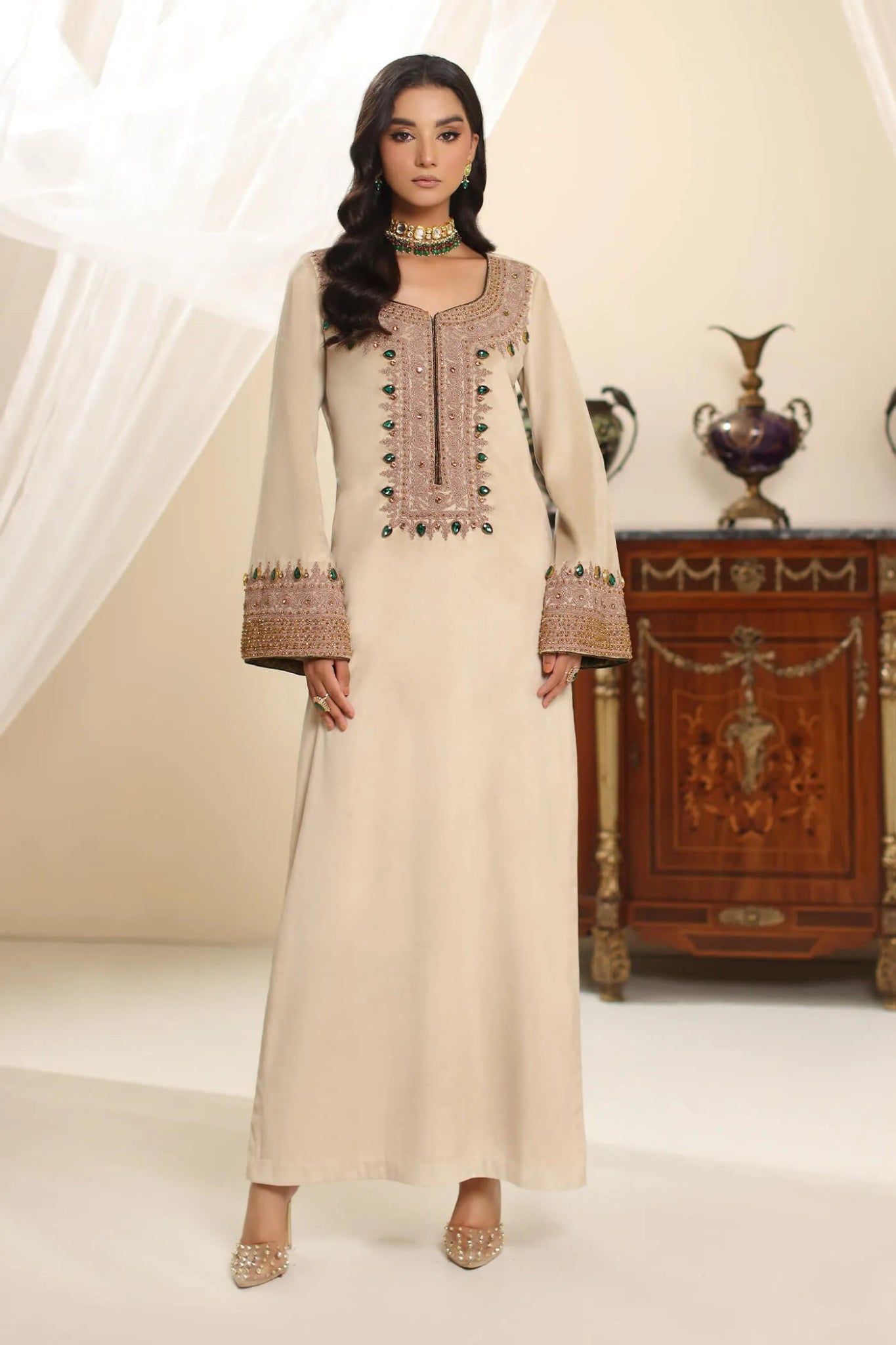 Model wearing Musferah Saad Champagne Grace dress in elegant beige from the Amor a La Vida collection, ideal for Pakistani wedding clothes online in the UK.