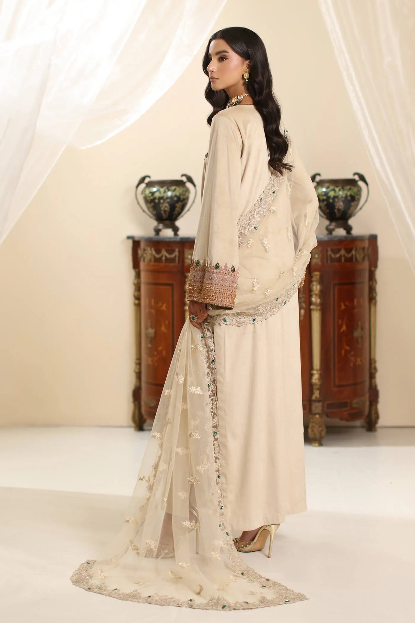 Model wearing Musferah Saad Champagne Grace dress in elegant beige from the Amor a La Vida collection, ideal for Pakistani wedding clothes online in the UK.