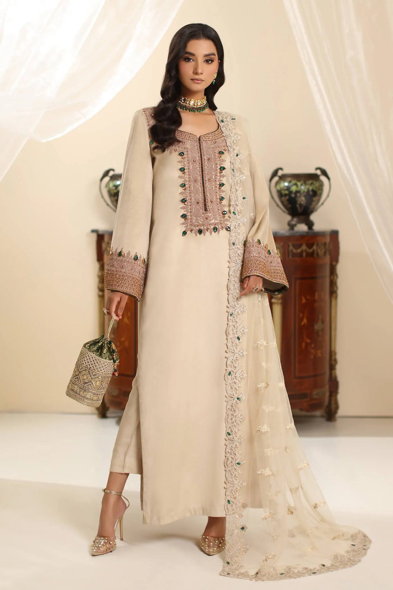 Model wearing Musferah Saad Champagne Grace dress in elegant beige from the Amor a La Vida collection, ideal for Pakistani wedding clothes online in the UK.