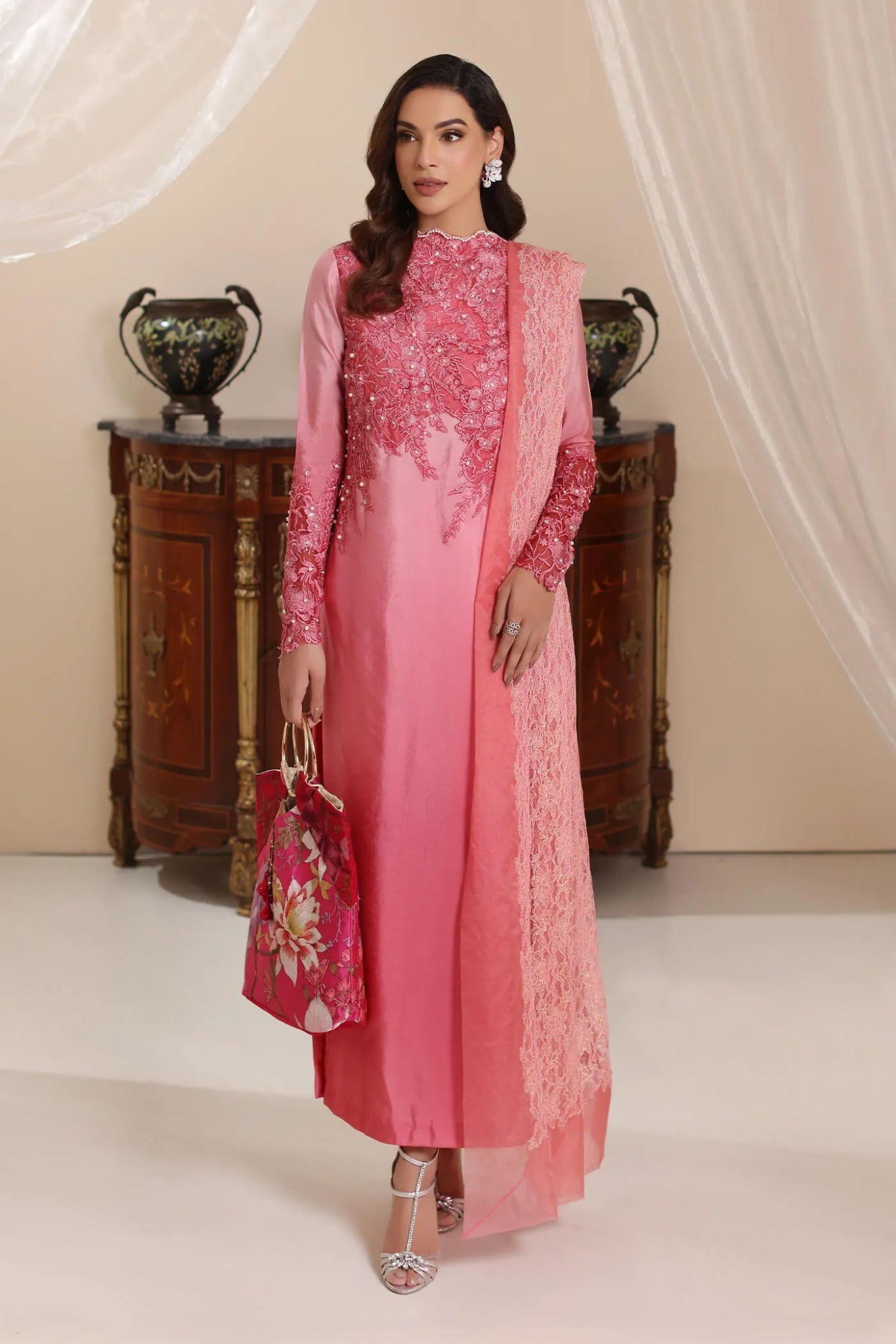 Model wearing Musferah Saad Whisper Noir dress in soft pink from the Amor a La Vida collection, showcasing intricate lace details. Ideal for Pakistani wedding clothes online in the UK.