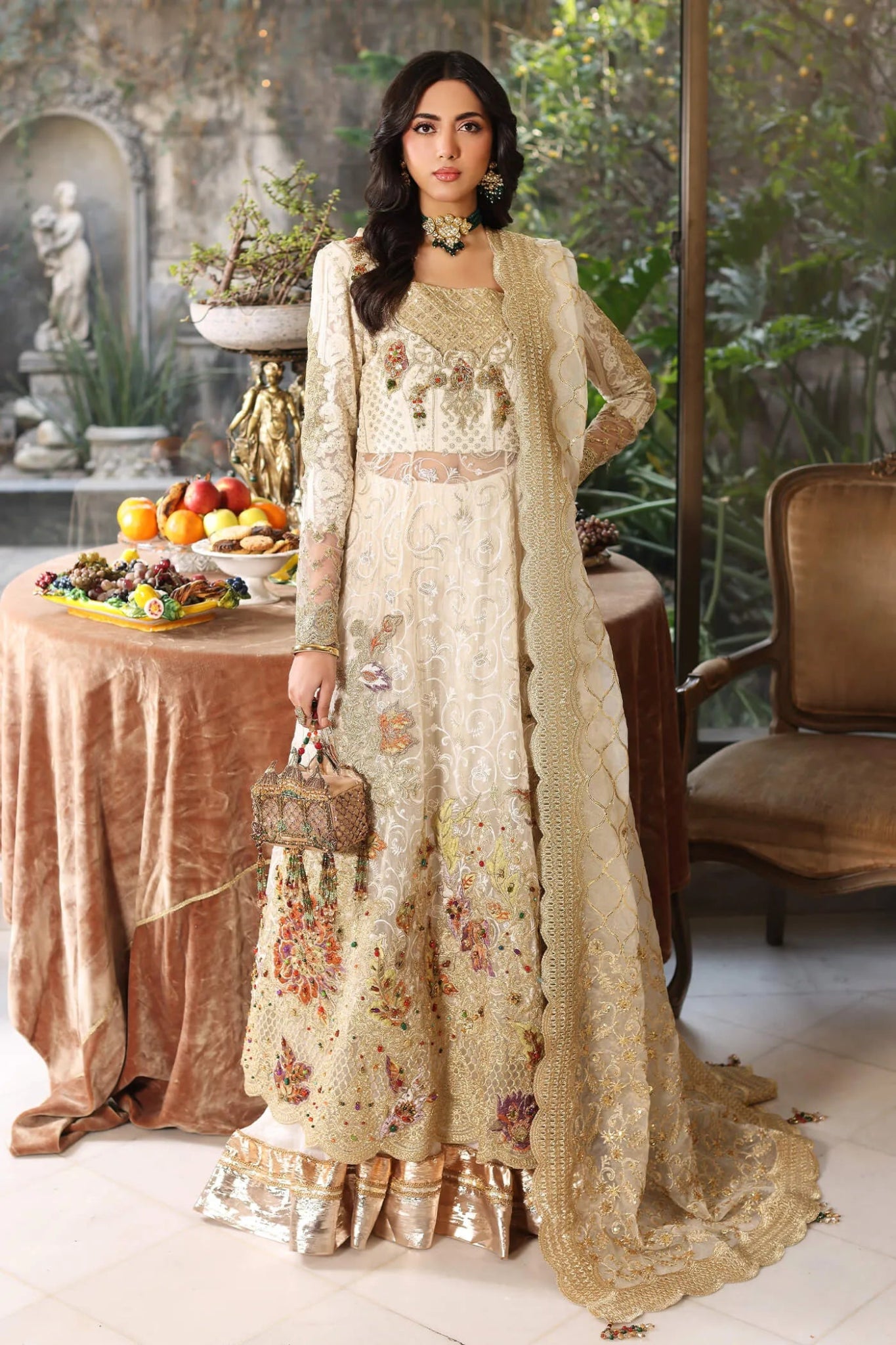 Model in FLORAL MIST dress by Musferah Saad, elegant Pakistani attire, UK exclusive.