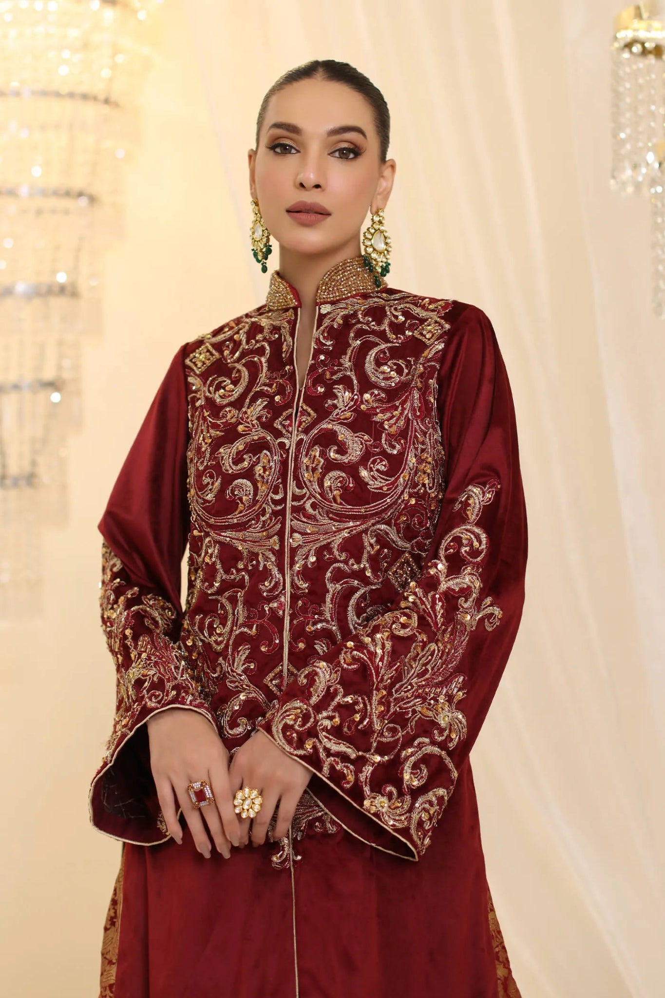 Model wearing Musferah Saad Grand Symphony dress in deep maroon from the Ethereal Dream Formals collection, ideal for Pakistani wedding clothes online in the UK.