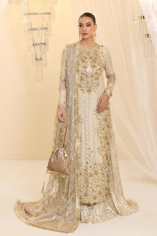 Model wearing Musferah Saad Ivory Empress dress in ivory from the Ethereal Dream Formals collection, ideal for Pakistani wedding clothes online in the UK.