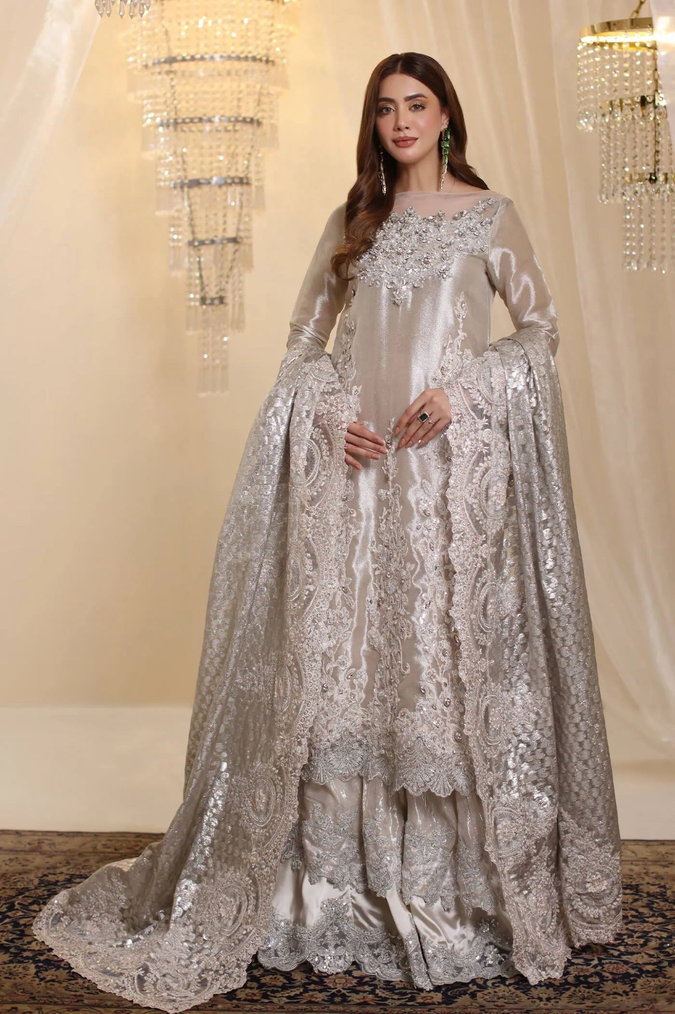 Model wearing Musferah Saad Lunar Radiance dress in silver from the Ethereal Dream Formals collection, perfect for Pakistani wedding clothes online in the UK.