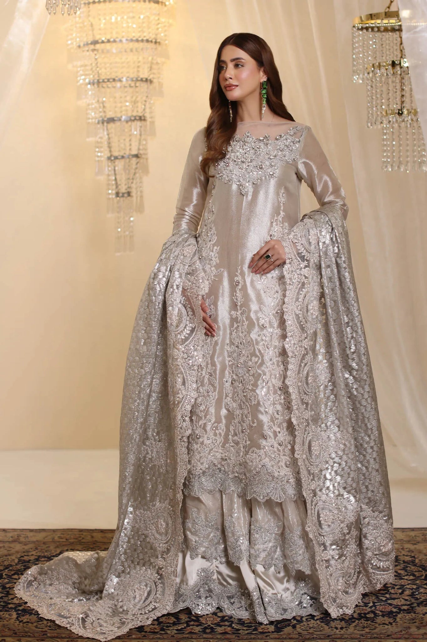 Model wearing Musferah Saad Lunar Radiance dress in silver from the Ethereal Dream Formals collection, perfect for Pakistani wedding clothes online in the UK.