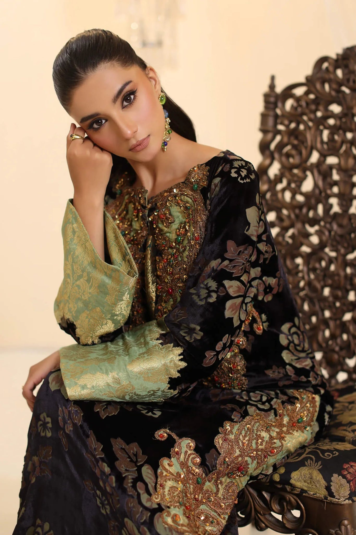 Model wearing Musferah Saad Midnight Muse dress in deep black and green from the Ethereal Dream Formals collection, ideal for Pakistani wedding clothes online in the UK.