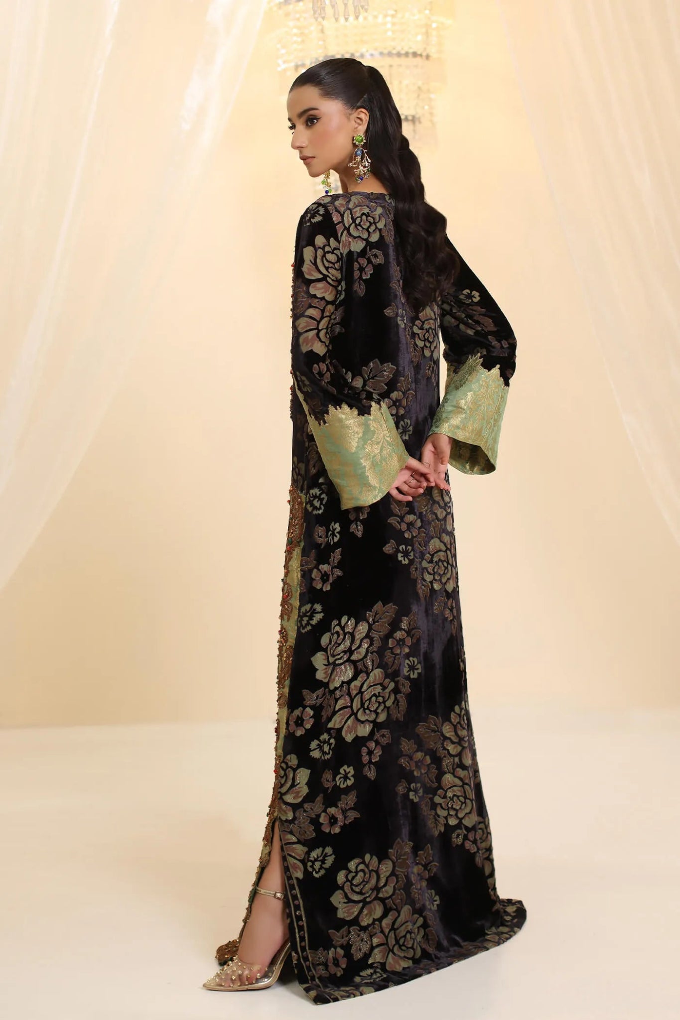 Model wearing Musferah Saad Midnight Muse dress in deep black and green from the Ethereal Dream Formals collection, ideal for Pakistani wedding clothes online in the UK.