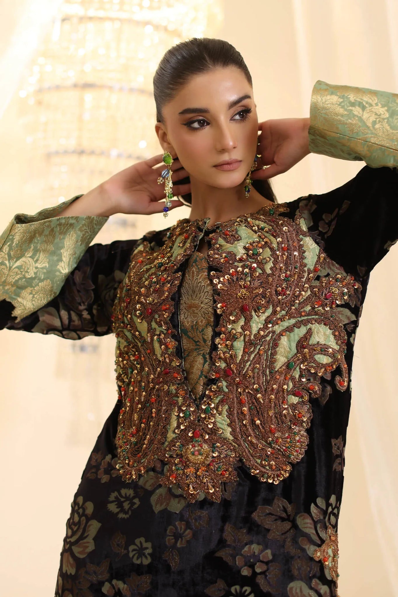 Model wearing Musferah Saad Midnight Muse dress in deep black and green from the Ethereal Dream Formals collection, ideal for Pakistani wedding clothes online in the UK.