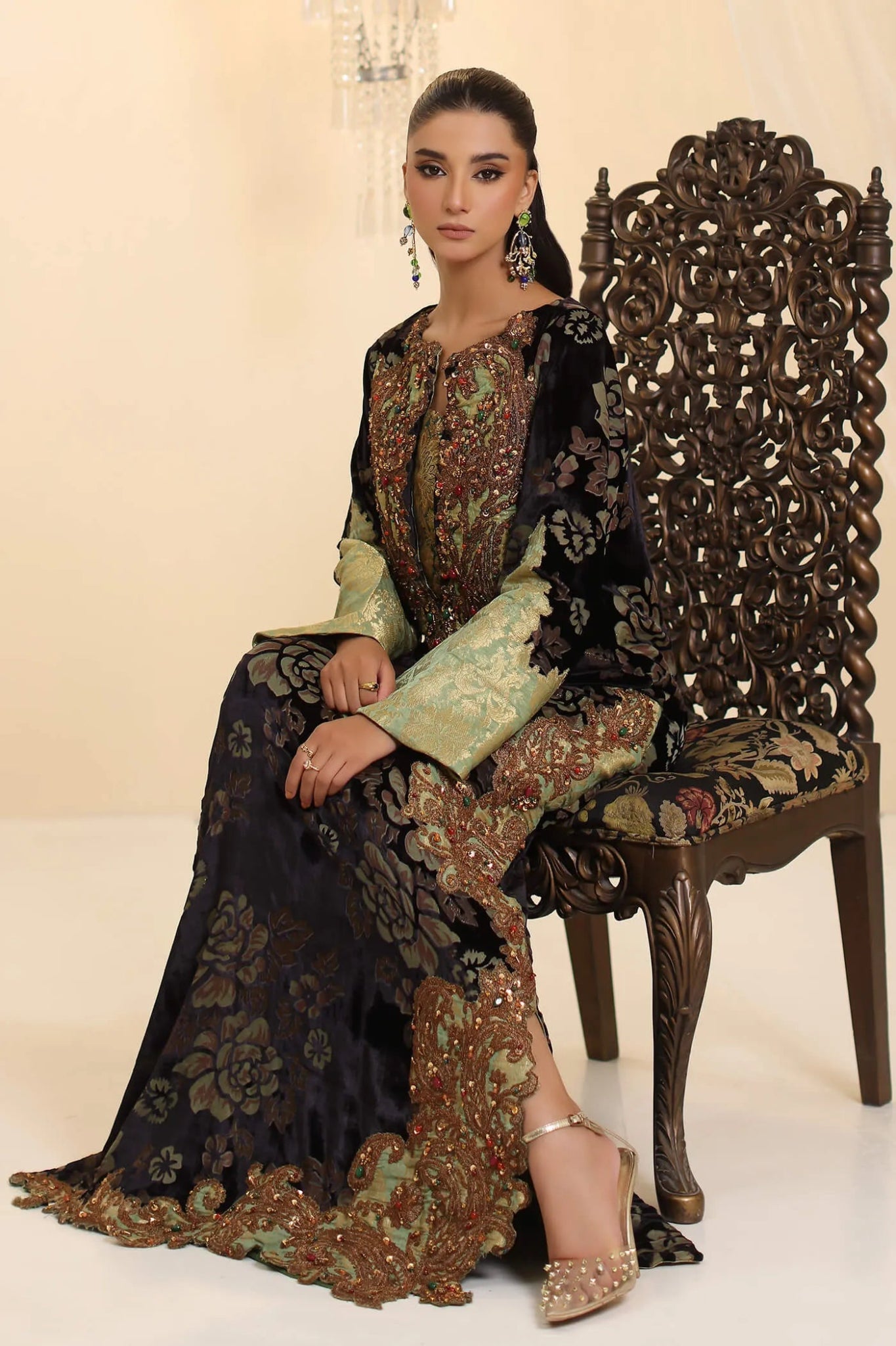 Model wearing Musferah Saad Midnight Muse dress in deep black and green from the Ethereal Dream Formals collection, ideal for Pakistani wedding clothes online in the UK.