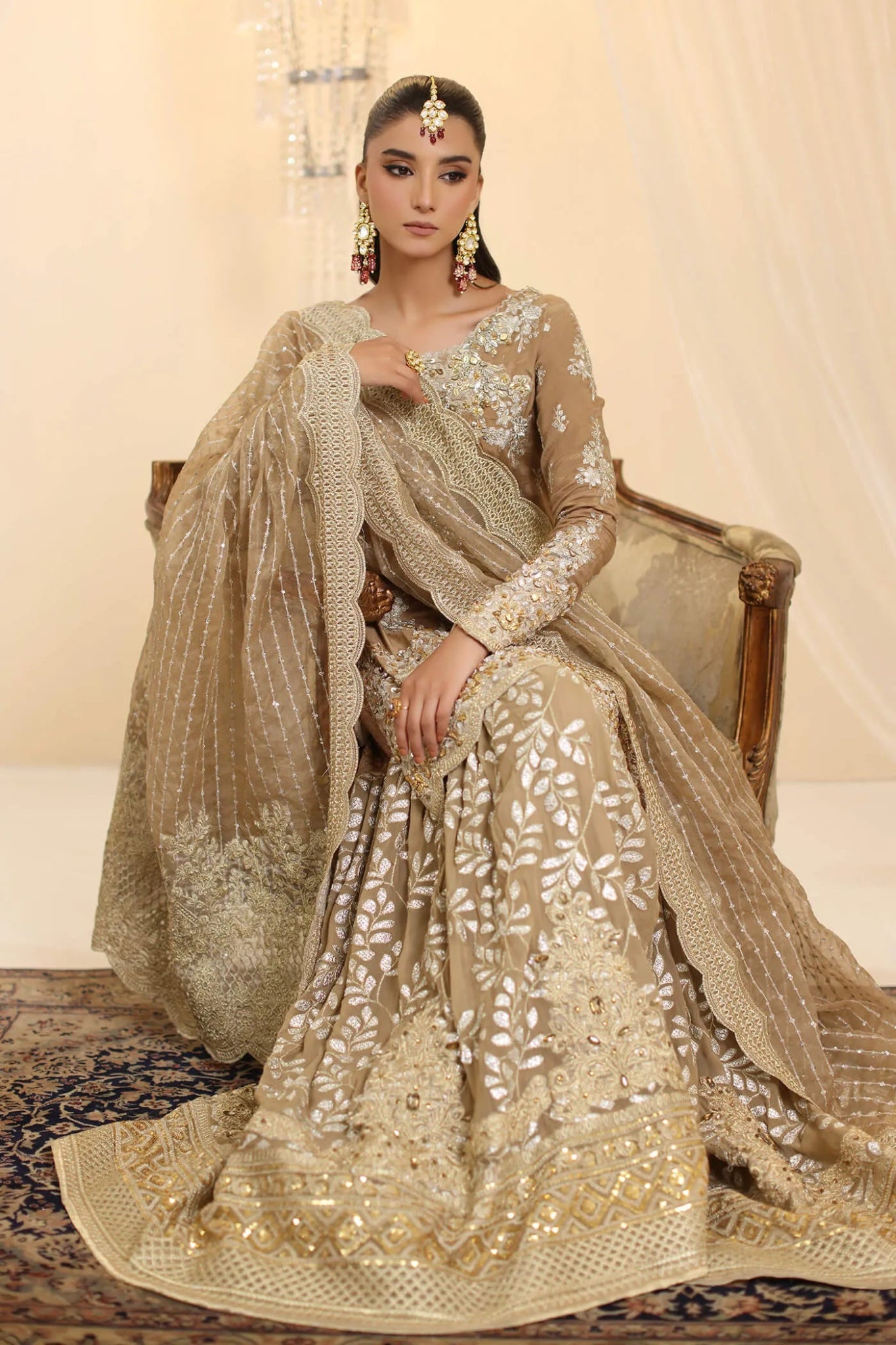 Model wearing Musferah Saad Sunlit Majesty dress in golden beige from the Ethereal Dream Formals collection, perfect for Pakistani wedding clothes online in the UK.