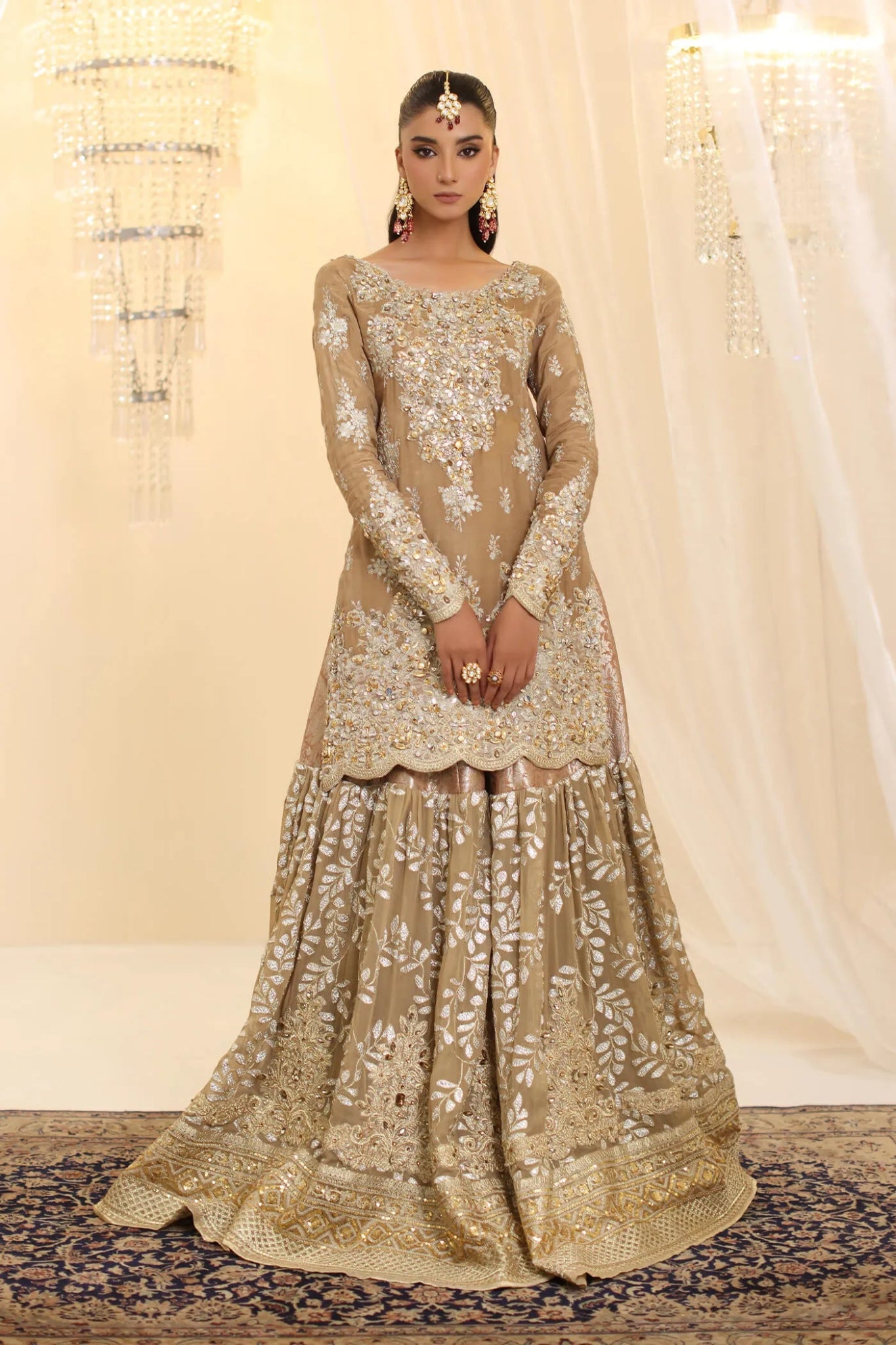 Model wearing Musferah Saad Sunlit Majesty dress in golden beige from the Ethereal Dream Formals collection, perfect for Pakistani wedding clothes online in the UK.