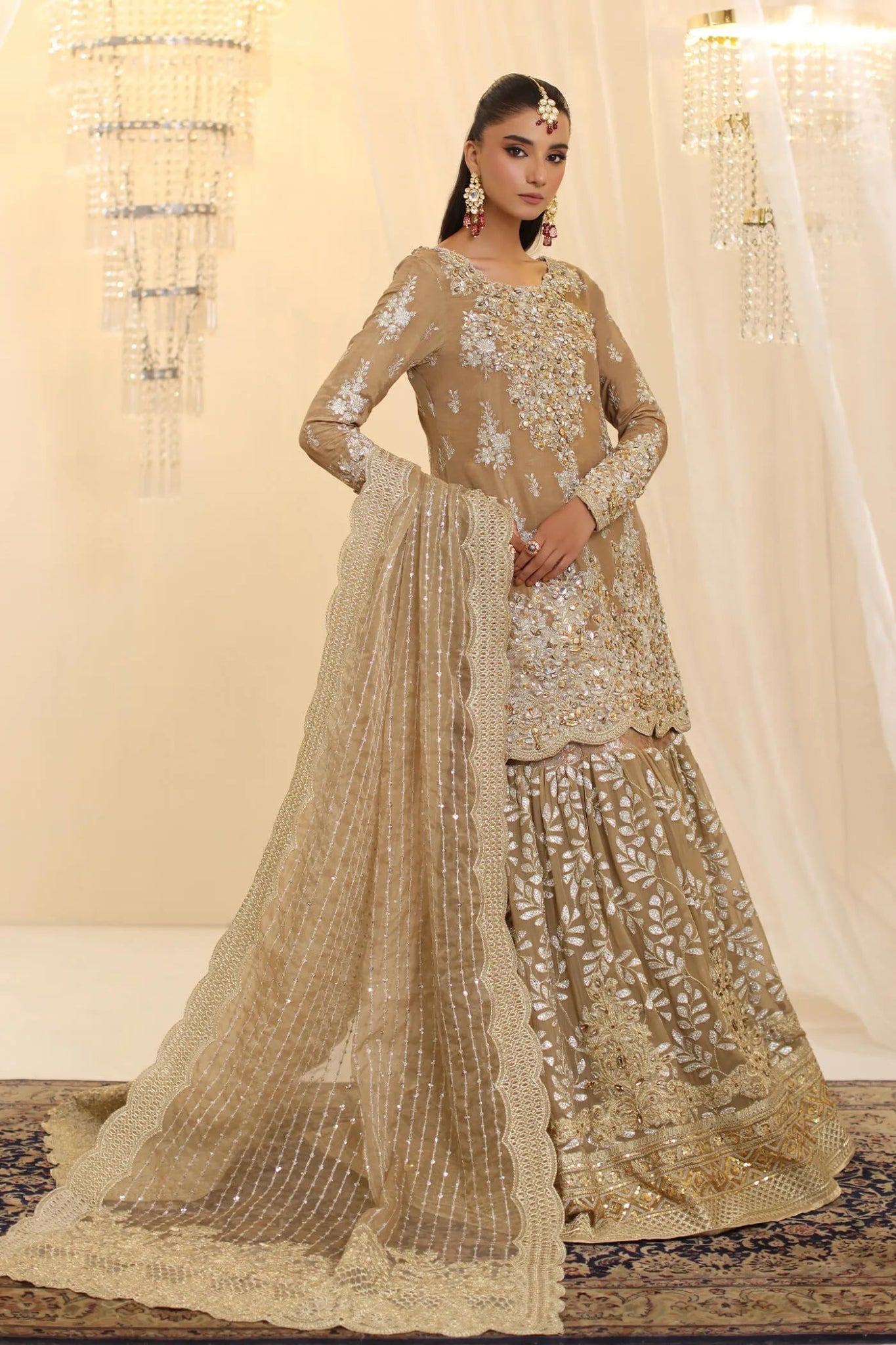 Model wearing Musferah Saad Sunlit Majesty dress in golden beige from the Ethereal Dream Formals collection, perfect for Pakistani wedding clothes online in the UK.