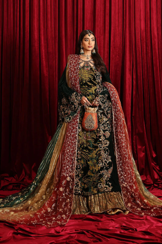 Model in Musferah Saad Radiant Spell, an emerald green Pakistani bridal dress in the UK.