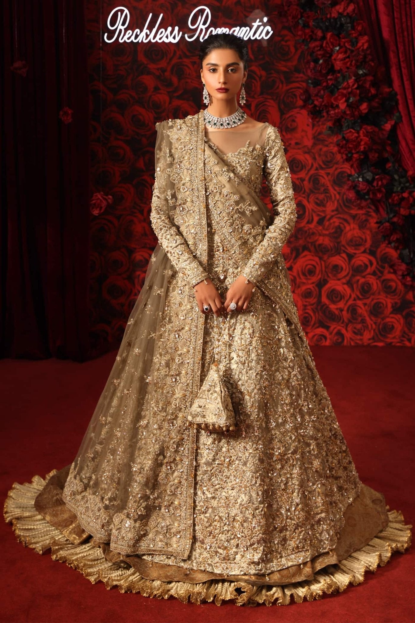 Model wearing Royal Symphony from Musferah Saad's Reckless Romantic in regal, bold colors. Pakistani clothes online in UK at Signature Labels