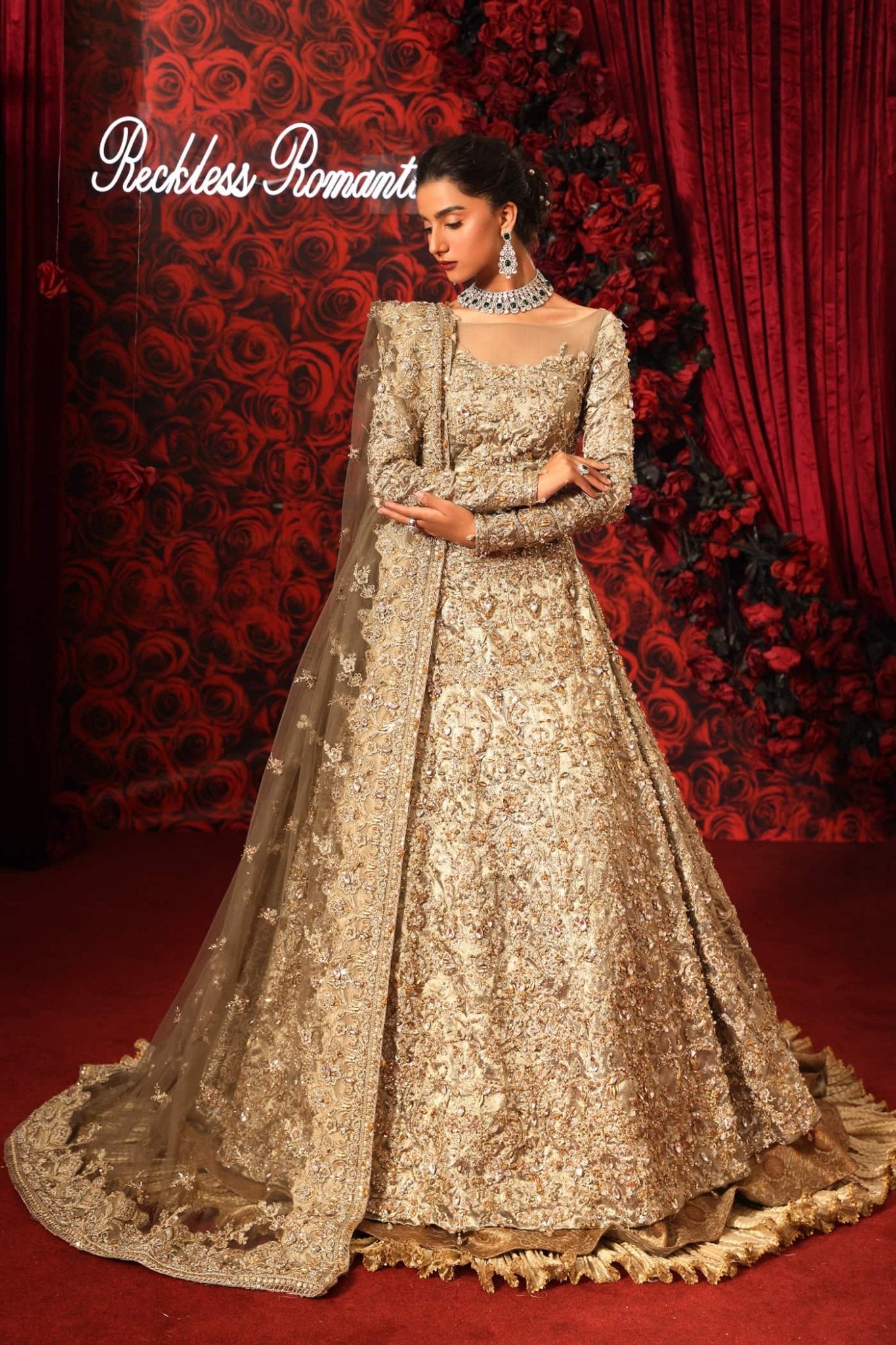 Model wearing Royal Symphony from Musferah Saad's Reckless Romantic in regal, bold colors. Pakistani clothes online in UK at Signature Labels