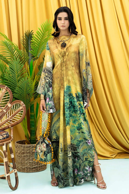 Model wearing mustard and green Aurelia dress from Musferah Saad's Resort collection '24, showcasing Pakistani clothes online in the UK.